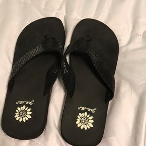 black yellow box flip flops